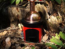 Kouřící kamínka/ kov /červená,  stojánek na tradiční vánoční vonné františky, ruční výroba z Německa